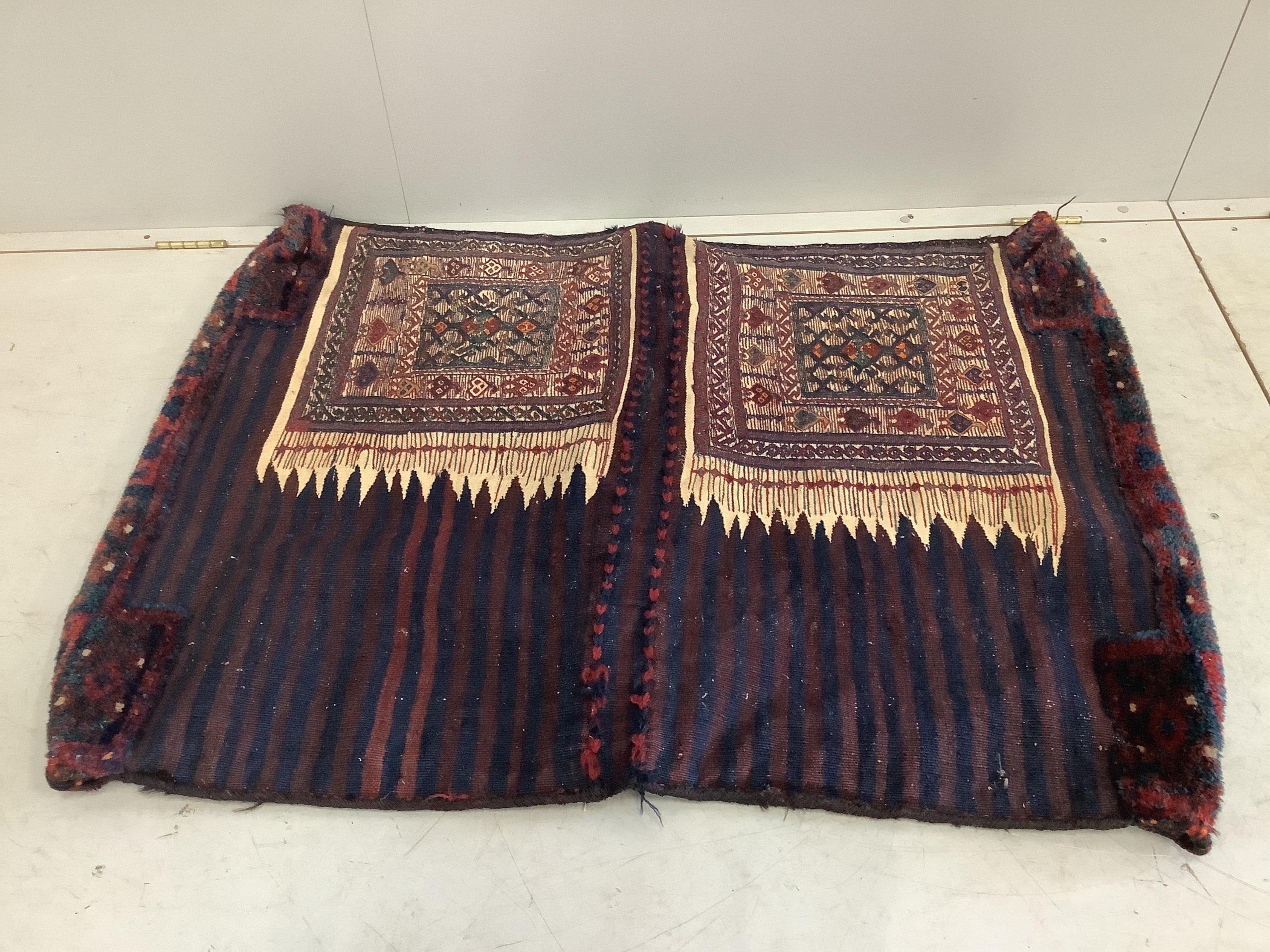 A Soumak double saddle bag and a similar salt bag, larger 128 x 90cm. Condition - fair to good